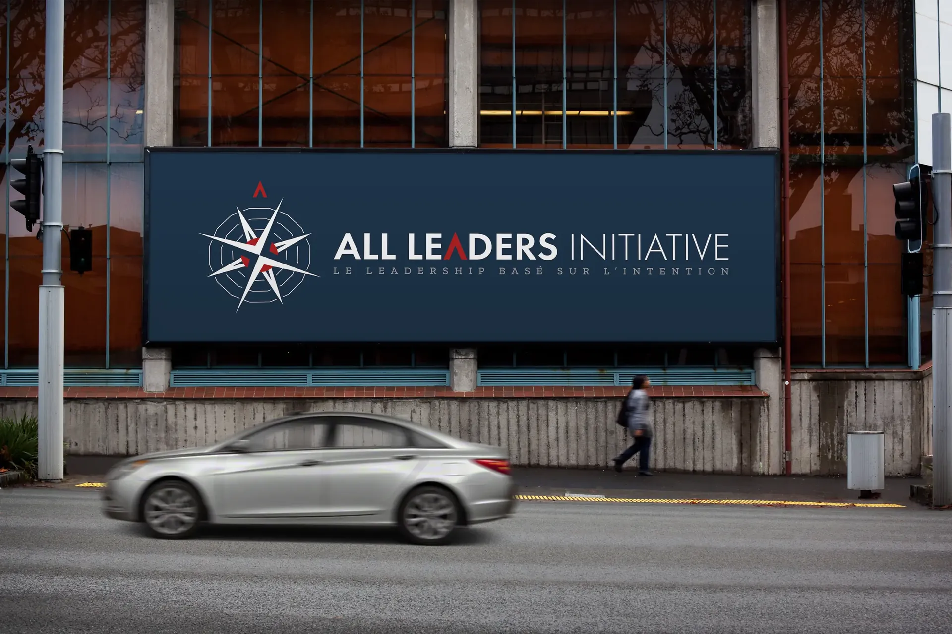 Affiche All Leaders Initiative dans la rue : logo et signature « Le leadership basé sur l'intention »